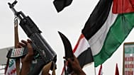 فایل: حامیان حوثی ها در جریان تظاهرات هفتگی ضد آمریکا و ضد اسرائیل در حالی که پرچم فلسطین را در صنعا بالا می بردند، شعار می دادند، 4 ژوئیه 2025