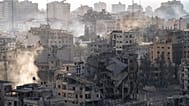 Destruction from Israeli aerial bombardment is seen in Gaza City, 11 October, 2023