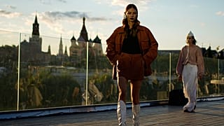 Models wear creations by Russian designer Alexander Arutyunov on a runway at Moscow Fashion Week on the Floating Bridge at Zaryadye park in Moscow, Russia. 