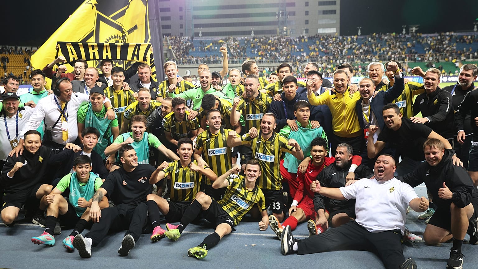 Kairat players celebrate after winning the Champions League playoff second leg match against Celtic in Almaty, 26 August 2025
