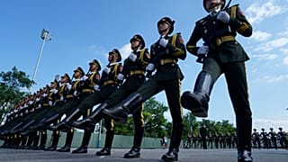 Chinese soldiers rehearses at a camp ahead of the Sept. 3 military parade to commemorate the 80th anniversary of Japan's World War II surrender, in Beijing on Aug. 20, 2025.
