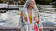 An older women by a dock
