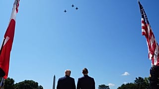 US President Donald Trump and Polish President Karol Nawrocki watch a military aircraft flyover at the White House, 3 September, 2025