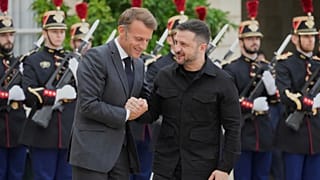French President Emmanuel Macron, left, greets Ukraine's President Volodymyr Zelenskyy prior to a meeting, at the Elysee Palace, in Paris, France, 3 Sept., 2025.