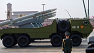 Missiles pass during a military parade to commemorate the 80th anniversary of Japan's World War II surrender held in front of Tiananmen Gate in Beijing, Wednesday, Sept. 3. 
