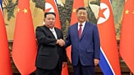 Kim Dzsongun észak-koreai és Hszi Csin-ping kínai elnök