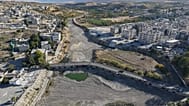A drone view shows the dried up Orontes River in Jisr al-Shughur, west of Idlib, Syria.