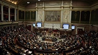 Lawmakers listen to French Prime Minister François Bayrou delivering his general policy speech in Paris, 14 January, 2025 
