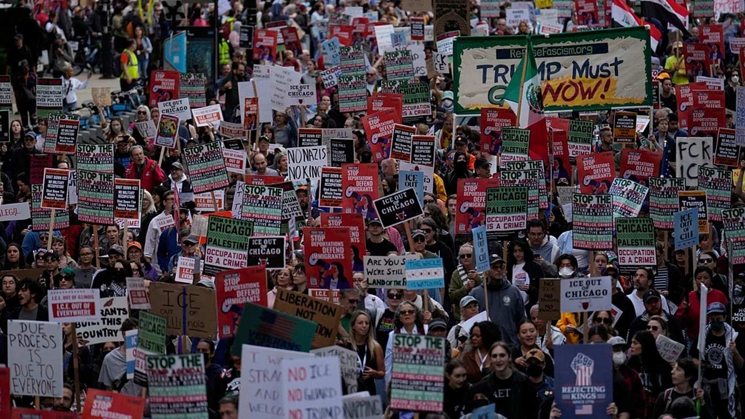 People march during Illinois Coalition for Immigrant & Refugee Rights' "Chicago Says No Trump No Troops" protest Saturday, 6 September 2025, in Chicago.