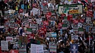 People march during Illinois Coalition for Immigrant & Refugee Rights' "Chicago Says No Trump No Troops" protest Saturday, 6 September 2025, in Chicago. 