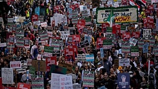 People march during Illinois Coalition for Immigrant & Refugee Rights' "Chicago Says No Trump No Troops" protest Saturday, 6 September 2025, in Chicago. 
