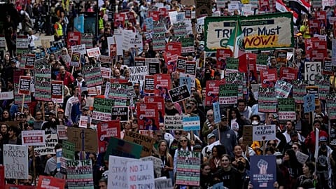 People march during Illinois Coalition for Immigrant & Refugee Rights' "Chicago Says No Trump No Troops" protest Saturday, 6 September 2025, in Chicago. 