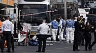 Israeli police and rescue teams respond at the scene of a shooting attack where several people killed and injured in Jerusalem, 8 September 2025