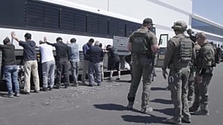 Manufacturing plant employees have their legs shackled at the Hyundai Motor Group’s electric vehicle plant in Georgia on 4 September, 2025. 