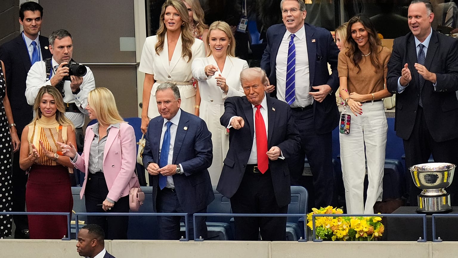President Donald Trump, center, attends the US Open tennis men's singles final Sunday, Sept. 7, 2025, in Flushing Meadows (AP Photo/Manuel Balce Ceneta)