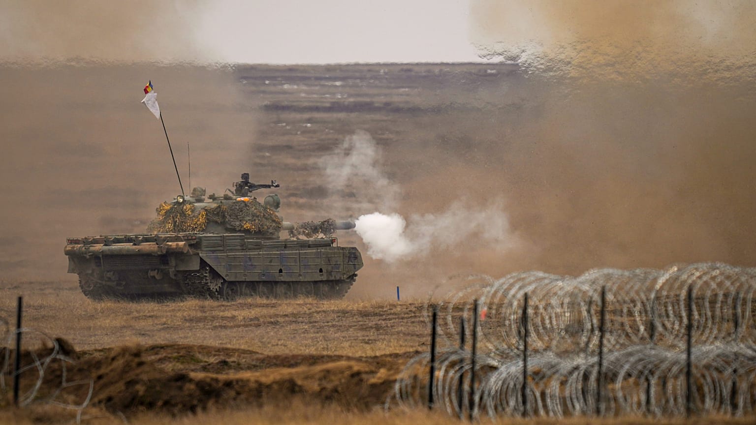 A tank fires during NATO's Steadfast Dart 2025 exercise, at a training range in Smardan, eastern Romania, 19 Feb., 2025. 