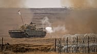 A tank fires during NATO's Steadfast Dart 2025 exercise, at a training range in Smardan, eastern Romania, 19 Feb., 2025.