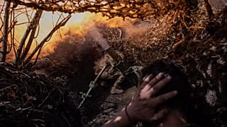 Soldiers fire a mortar towards positions of Russian troops near Kostyantynivka in the Donetsk region, 26 August, 2025