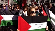 SCREENSHOT - Protesters call for full arms embargo on Israel as government decides on implementation