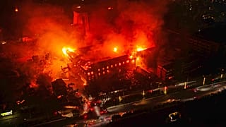Flames come out from the residence of Nepal President Ram Chandra Poudel after it was set on fire by protesters in Kathmandu, 9 September 2025
