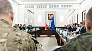 Polish Prime Minister Donald Tusk holds a meeting at the chancellery in Warsaw on Sept. 10, 2025, following violations of Polish airspace during a Russian attack.