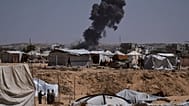 Smoke rises from an Israeli army bombardment in Khan Younis, central Gaza Strip, Thursday, Sept. 11, 2025