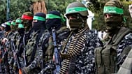 مقاتلون ملثمون من كتائب عز الدين القسام