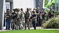 Police prepare to sweep a building at Utah Valley University, Wednesday, Sept. 10, 2025, in Orem, Utah. 