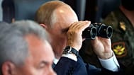 FILE: Russian President Vladimir Putin watches through during the joint strategic exercise of the armed forces of the Russian Federation and the Republic of Belarus Zapad-2021
