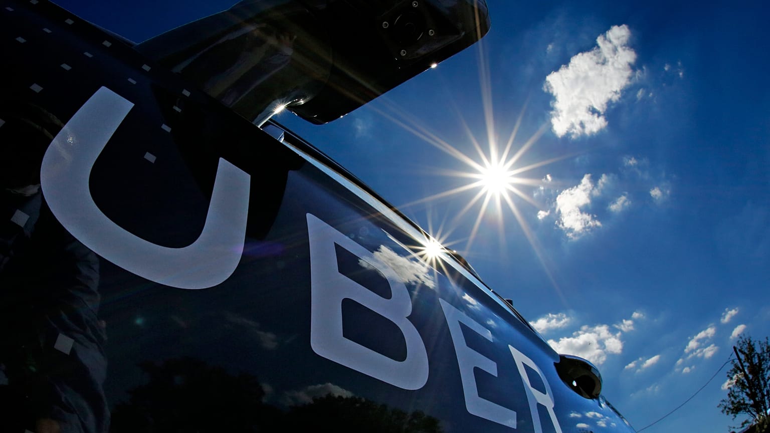 A self driving Uber sits ready to take journalists for a ride during a media preview in Pittsburgh, Monday, Sept. 12, 2016. 