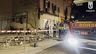 Firefighters work throughout the early hours of Sunday recover the body of the man who died in an explosion caused by a suspected gas leak in Madrid on 14 September 2025.