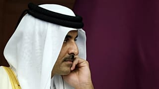FILE - The Emir of Qatar, Sheikh Tamim bin Hamad Al Thani reacts during a meeting, in Astana, Kazakhstan, Thursday, Oct. 13, 2022. Sheikh Tamim bin Hamad Al Thani, channeled t