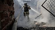 Archive photo: firefighters puts out fire after Russian drone attack struck Druzhkivka market, Donetsk region, Ukraine, Aug. 2, 2025.
