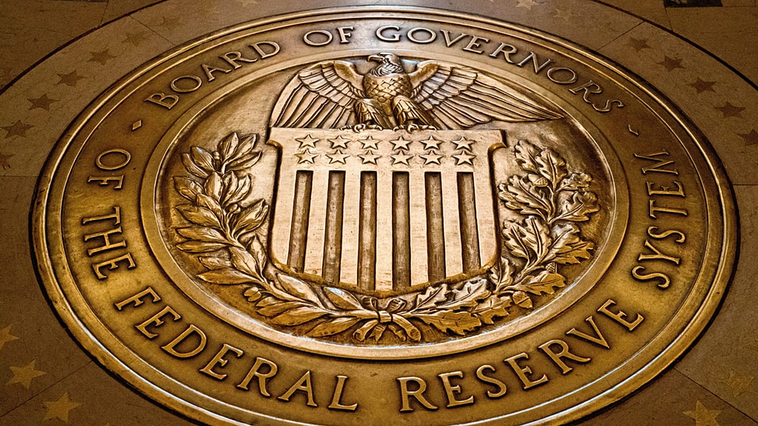 File photo - The seal of the Board of Governors of the United States Federal Reserve System is displayed in the ground at the Marriner S. Eccles Federal Reserve Board Building