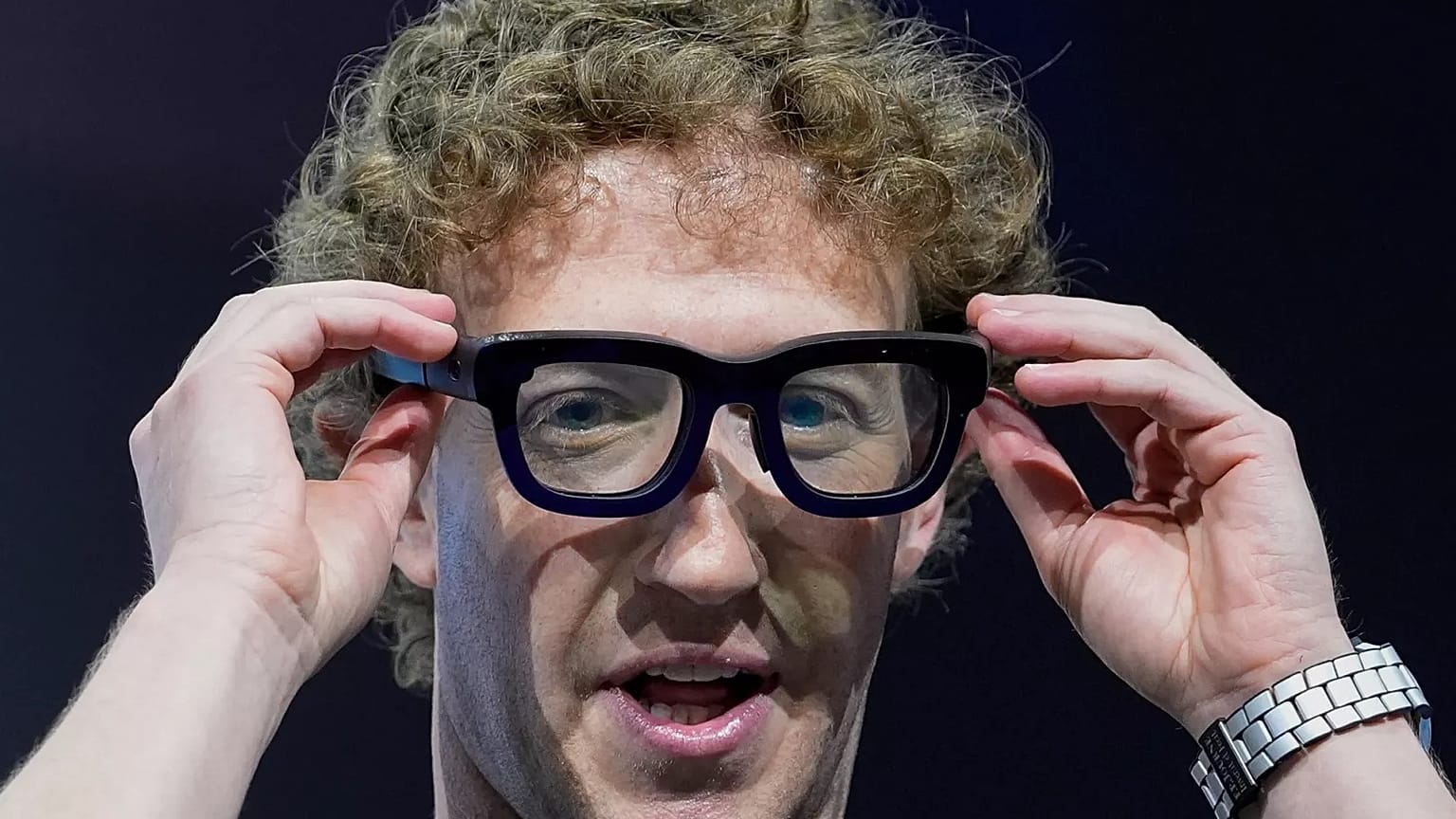 FILE - Mark Zuckerberg wears a pair of Orion AR glasses during the Meta Connect conference on Sept. 25, 2024, in Menlo Park, Calif.