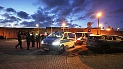 Police cars guard the prison where a suspect in the 2007 disappearance of British toddler Madeleine McCann, is serving a prison sentence, in Sehnde, 17 September 2025