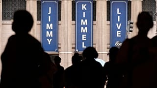 People walk by the Jimmy Kimmel Live studio on Hollywood Blvd in Los Angeles, 17 September 2025