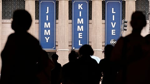 People walk by the Jimmy Kimmel Live studio on Hollywood Blvd in Los Angeles, 17 September 2025