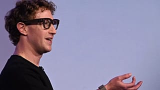 Meta CEO Mark Zuckerberg wears artificial intelligence-powered smart glasses and a wristband as he speaks during the company's Connect developer conference ,Sept. 17, 2025