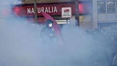 A protester stands in tear gas smoke during a demonstration in Paris, 18 September, 2025