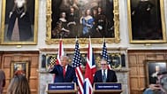 US President Donald Trump gestures next to Britain's Prime Minister Keir Starmer during a joint press conference at Chequers, 18 September, 2025
