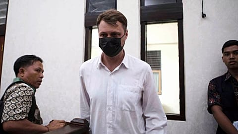 Ukrainian citizen Roman Nazarenko arrives for a hearing at the district court in Denpasar, 18 September, 2025