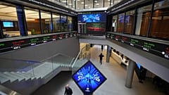 FTSE market information is displayed inside the London Stock Exchange, in the City of London. 17 March 2025.