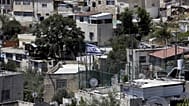 علم إسرائيل فوق منزل مملوك ليهود في حي فلسطيني