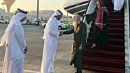 A Qatari official welcomes the released British couple, Barbie and Peter Reynolds, as they step off the plane upon their arrival in Doha, Qatar, Friday, Sept. 19, 2025. 