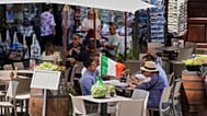 Persone a tavola in Italia