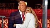 US President Donald Trump hugs Erika Kirk at the memorial of her husband, conservative activist Charlie Kirk, at State Farm Stadium in Glendale, 21 September 2025
