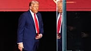 President Donald Trump arrives on stage to speak at a memorial for conservative activist Charlie Kirk, at State Farm Stadium in Glendale, 21 September 2025