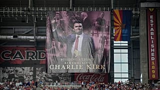 A banner for conservative activist Charlie Kirk is seen during a memorial service at State Farm Stadium in Glendale, 21 September 2025