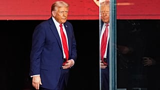 President Donald Trump arrives on stage to speak at a memorial for conservative activist Charlie Kirk, at State Farm Stadium in Glendale, 21 September 2025